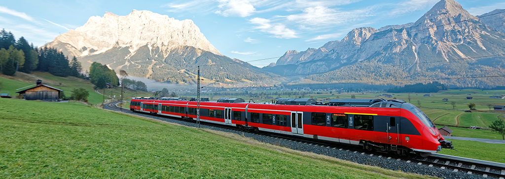 masthead-austria-mountains-train-in-valley